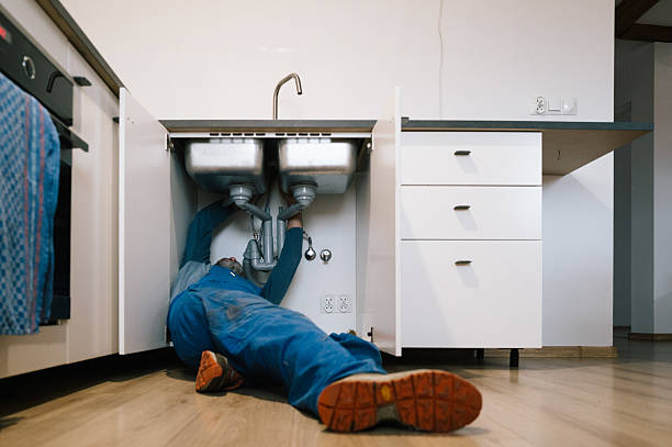 Professional Drain Cleaning technician working in Boulder, MT